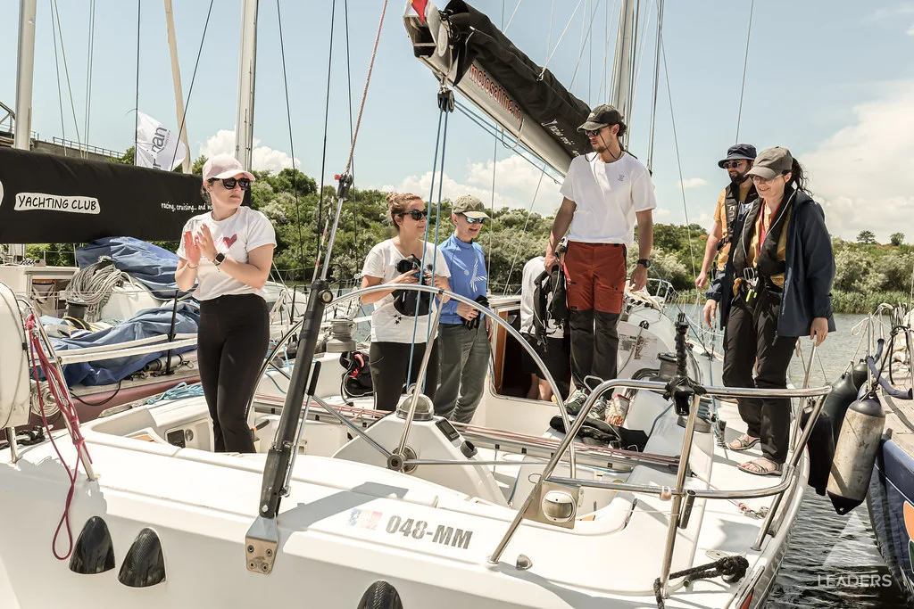 Leaders Challenge participants working together aboard a sailing boat in Mangalia